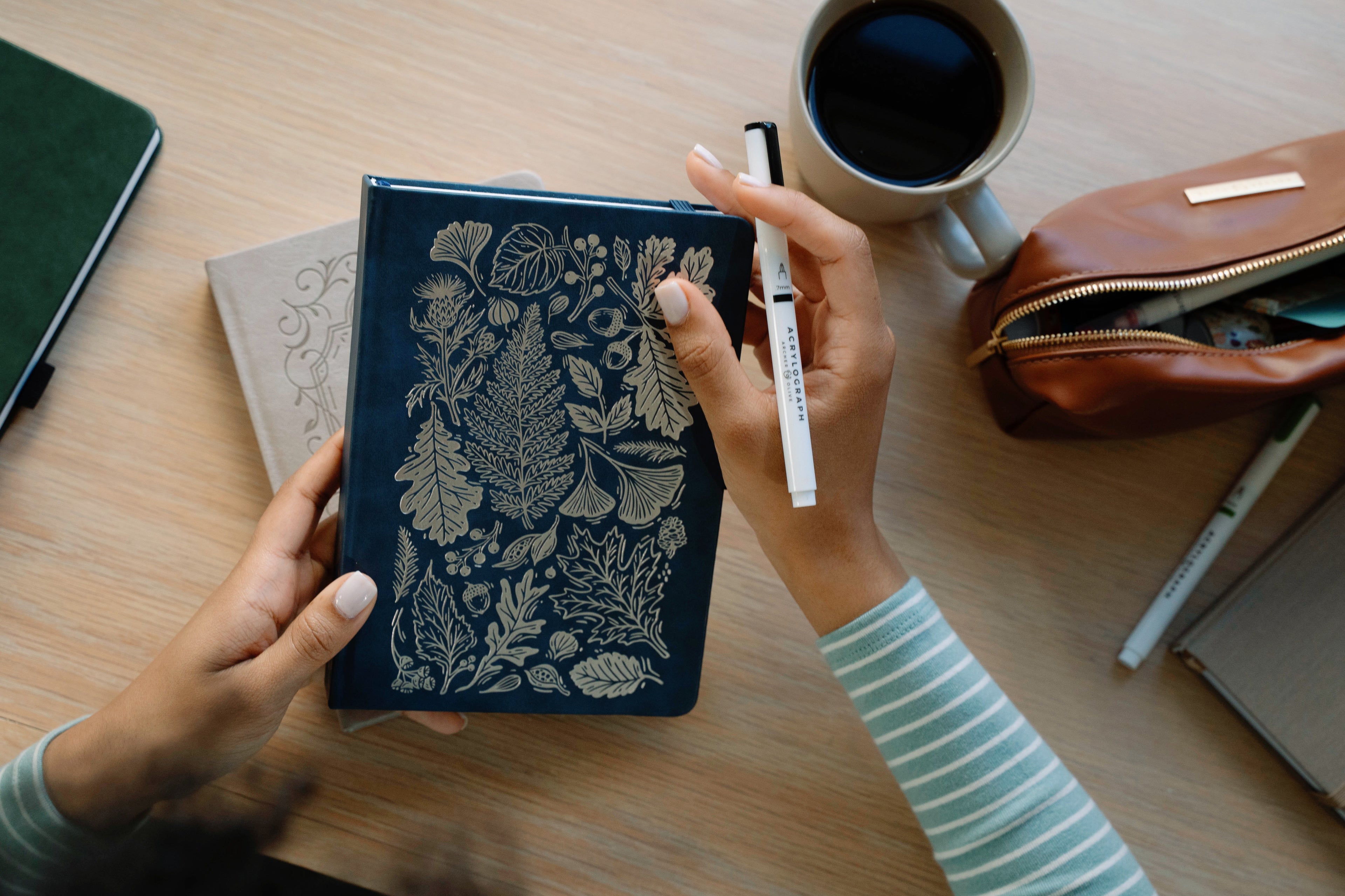 Elegant journals and pens come to life in bright, inspiring spaces. These photos highlight the art of journaling through texture, design, and everyday beauty.