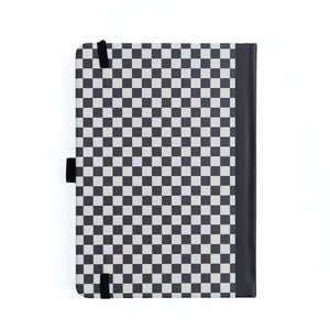 Checkered patterned notebook cover on a white background
