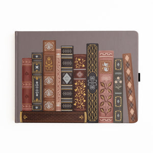 Taupe vegan leather notebook illustrated with a row of ornate gilded book spines