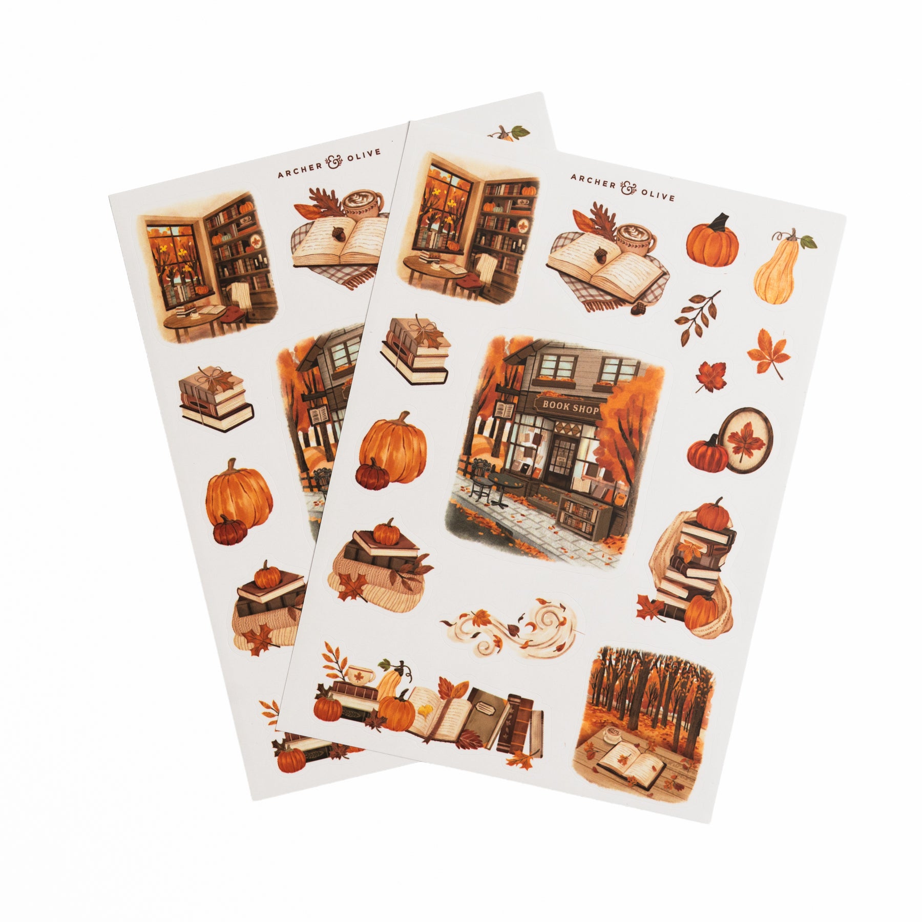 Two sticker sheets with autumn café, book stack, and pumpkin illustrations