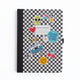 Checkered notebook with colorful stickers on a white background