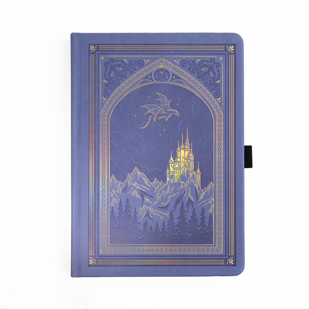 Decorative notebook with a fantasy design of a castle and dragon on a periwinkle background