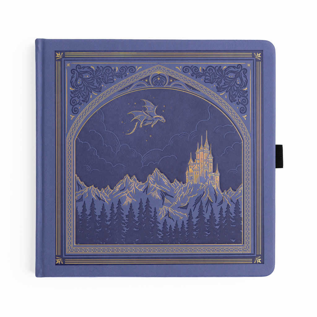 Periwinkle notebook with a castle and dragon design on the cover