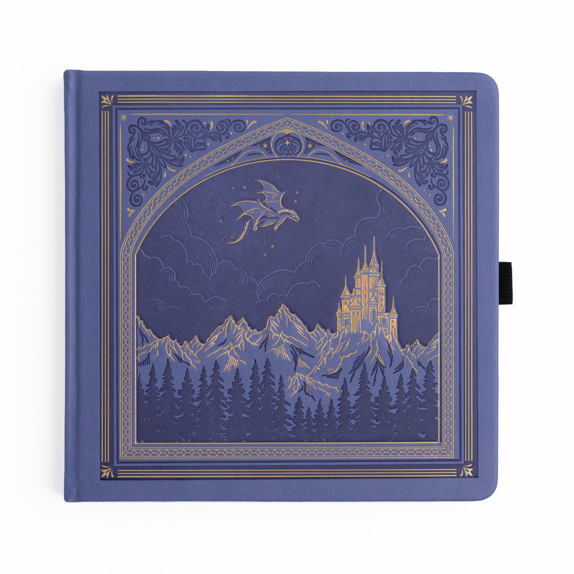 Periwinkle notebook with a castle and dragon design on the cover