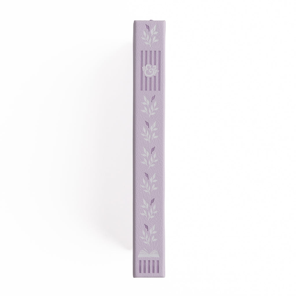Lavender-colored decorative item with leaf patterns on a white background