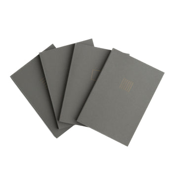 Set of five gray notebooks on a white background