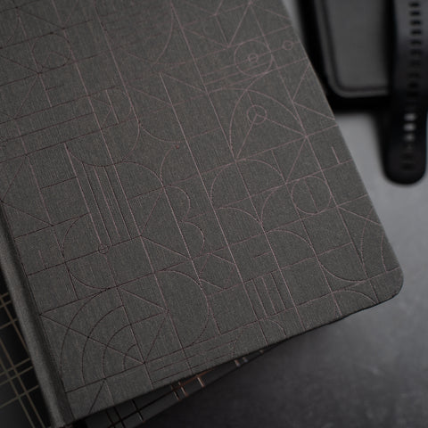 Marked. Dot Grid Notebook