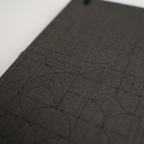 Marked. Dot Grid Notebook