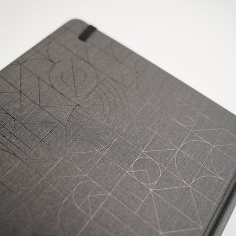 Marked. Dot Grid Notebook