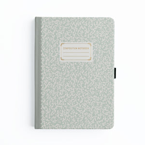Composition notebook with a subtle pattern on a white background